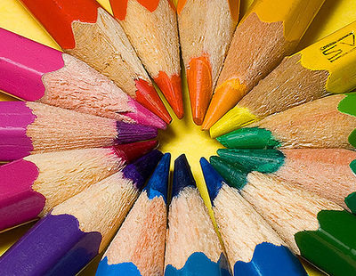 blue, purple, green, yellow and orange crayons