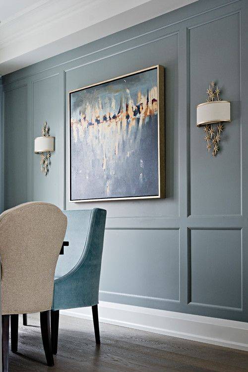 Dining room with full wall wainscoting in blue