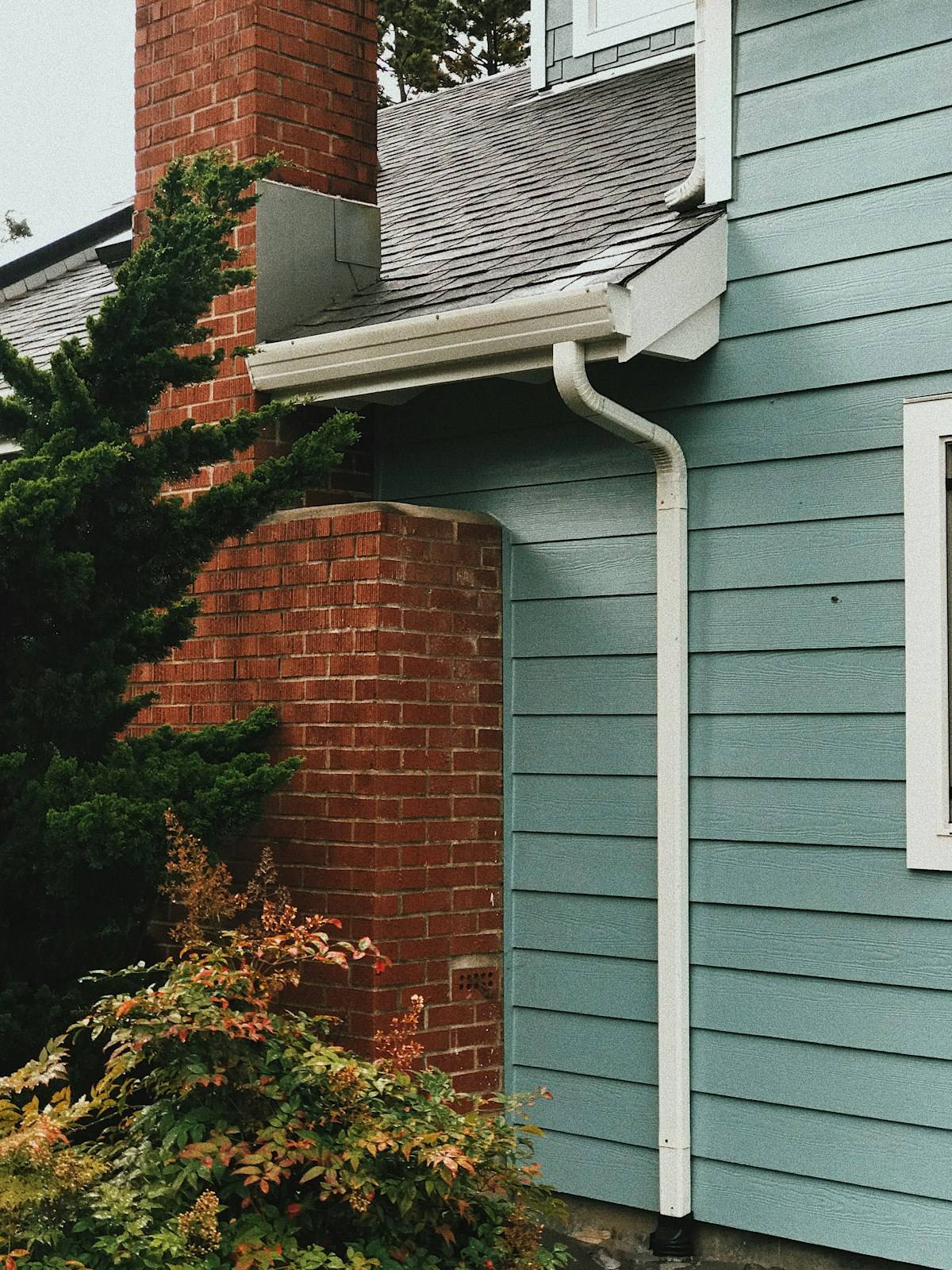 Gutters along the side of a green home